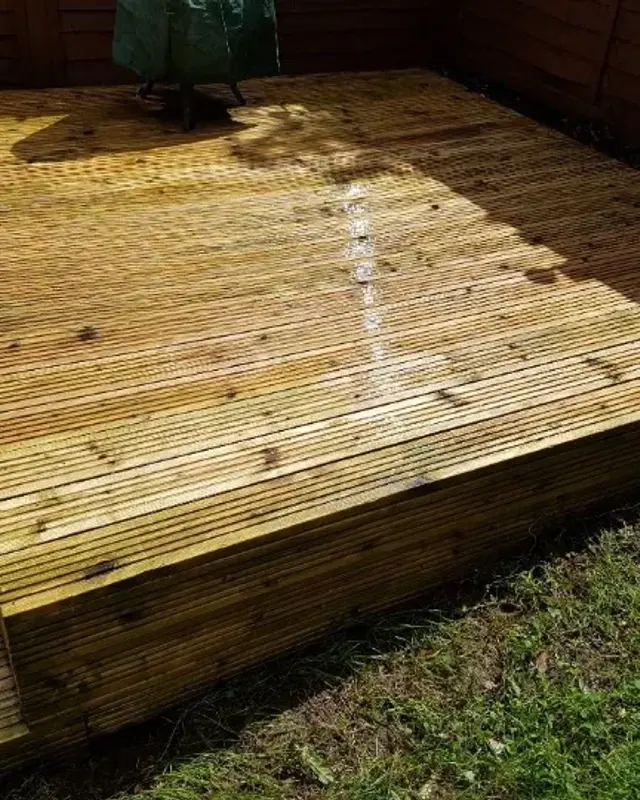 The same decking back to golden timber after cleaning