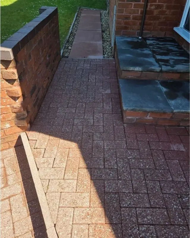 The same paving and steps clean after pressure washing